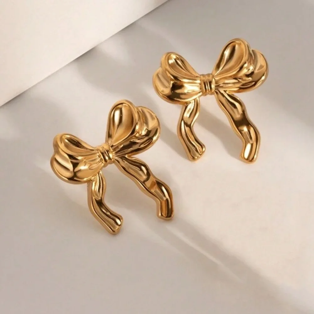 gold bow earrings - Picture 2 of 3